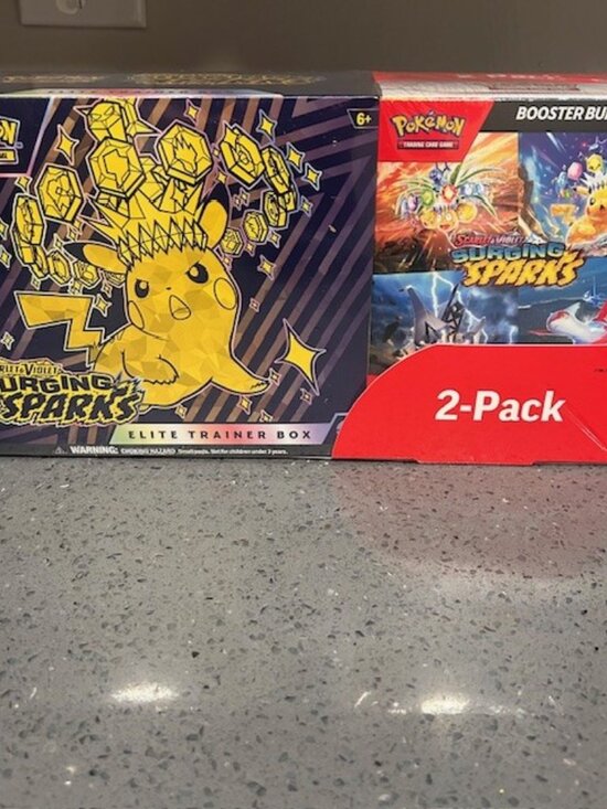 Pokmon Scarlet & Violet Prismatic Evolutions and Surging Sparks Costco  Bundle